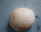 A picture of step 4 of Mahamri (Cardamom and fresh coconut).