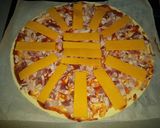 Foto del paso 4 de la receta Estrella de hojaldre con bacon y queso