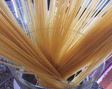 A picture of step 3 of Angel Hair Pasta Garlic, Tomatos and Achar Masala.