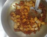 A picture of step 4 of Potato capsicum veg.