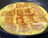 A picture of step 8 of Pan-Fried Tofu and Eggs with Oyster Sauce.