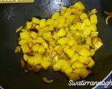 A picture of step 6 of Aloo Poha (Potato with Flattened Rice Pulao).
