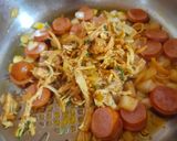 Foto del paso 4 de la receta: Arroz con pollo y salchichas a mi manera
