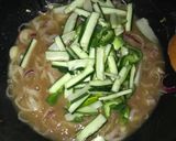 A picture of step 8 of Vegetable rice and white chicken stew.