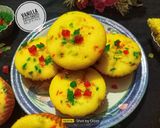 A picture of step 7 of Vanilla Tutti Frutti Muffins.