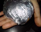 A picture of step 2 of Cheese pizza potato.
