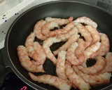 Foto del paso 9 de la receta: Arroz caldoso de bogavantes y langostinos al whisky con coquinas al ajillo
