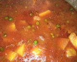 A picture of step 6 of Aloo Mater salan.