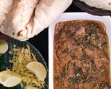 A picture of step 6 of Kaleji Masala with Naan.