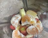 A picture of step 2 of Orange twister juice.