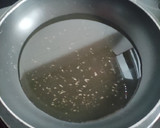 Foto del paso 3 de la receta: Cacahuetes fritos con miel y sal