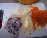 A picture of step 13 of Tumeric rice with sausages, egg curry and salad.