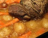 A picture of step 6 of Hearb roasted leg of lamb roll with potatoes and carrots.