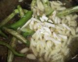 A picture of step 2 of Dal fry malai marke.
