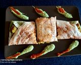 A picture of step 4 of Schezwan chutney dosa.