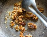 A picture of step 1 of Black carrots and walnuts halwa.