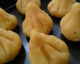 A picture of step 30 of Puran Poli Modak.