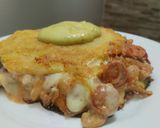 Foto del paso 10 de la receta: Arepa rellena de salchicha, pimentón, cebolla y queso🥯🌭🧀