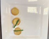 A picture of step 17 of Crispy Skin Salmon, Asparagus with Fondant Potato and Chestnut Sauce.