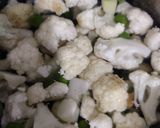 A picture of step 2 of Mix millet khichdi with vegetables.