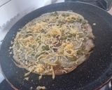A picture of step 5 of Cheese Chilli Dosa.
