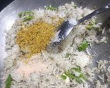 A picture of step 6 of Dessicated coconut rice.