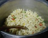 A picture of step 12 of Tikka macaroni.