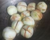 A picture of step 3 of Stuffed tinde masala.