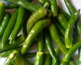 A picture of step 1 of Teekhi mirch ka achar- January mein Mirchi ka tadka🌶️🌶️.