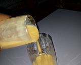 A picture of step 4 of Mango,banana & orange smoothy.