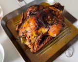 A picture of step 4 of Garlic Butter Roast Chicken with herbs.