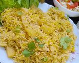 A picture of step 5 of Alu Biryani with kachumar salad.