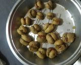 A picture of step 8 of Cheesy stuffed mushrooms :).
