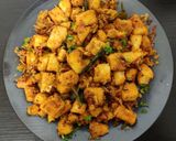 A picture of step 4 of Tawa Fried masala Idly.