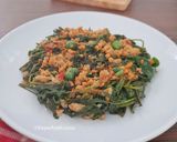 Foto langkah ke 3 dari resep 1097. Kangkung Sambal Oncom.