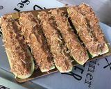 Une image de l'étape 18 de Courgettes farcies carotte jambon emmental.