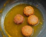 A picture of step 4 of Orange Bread balls.