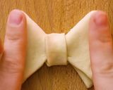 Foto del paso 6 de la receta: Masitas en forma de moño 👏🏼 🎀