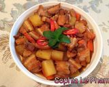 A picture of step 9 of Braised Pork Belly with Daikon and Carrots.