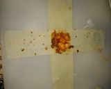 A picture of step 9 of Bihari Parcels with cheesy blast.