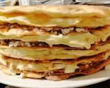 Foto del paso 4 de la receta: Torta de hojarasca, manjar y crema