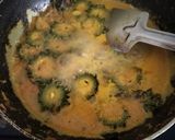 A picture of step 2 of Kerala style karela masala curry.