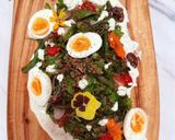A picture of step 8 of Kinda Nicoise with Fried Green Beans, Roasted Kale, Lentils, Boiled Eggs and Caper Mayo.