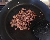 A picture of step 1 of Mezze Maniche with Broccoli Cream and Sausage.