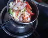 A picture of step 6 of Rajasthani gulab jamun curry in Badami gravy.