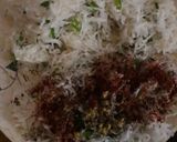 A picture of step 7 of Mooli prantha with butter.