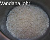 A picture of step 1 of Jeera Rice.