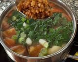 A picture of step 4 of Cambodian fish and pineapple soup.