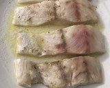 Foto del paso 4 de la receta: Perca con ajo y patatas al microondas