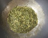 A picture of step 2 of Japanese green tea leaf - refreshed and revived again.